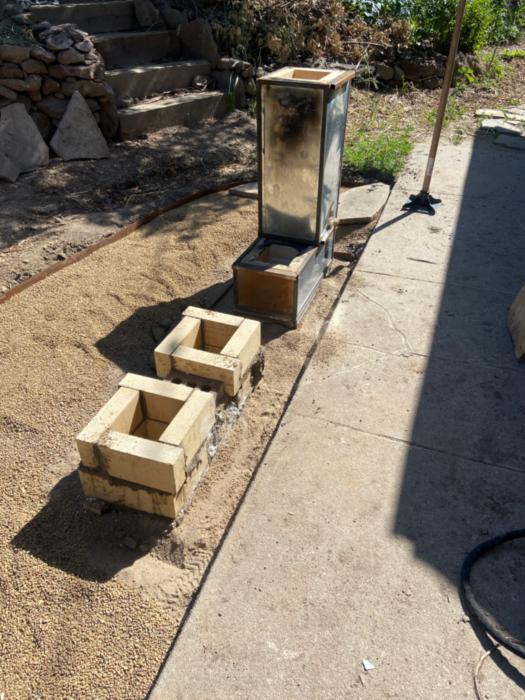 continuing to lay the j-tube brick