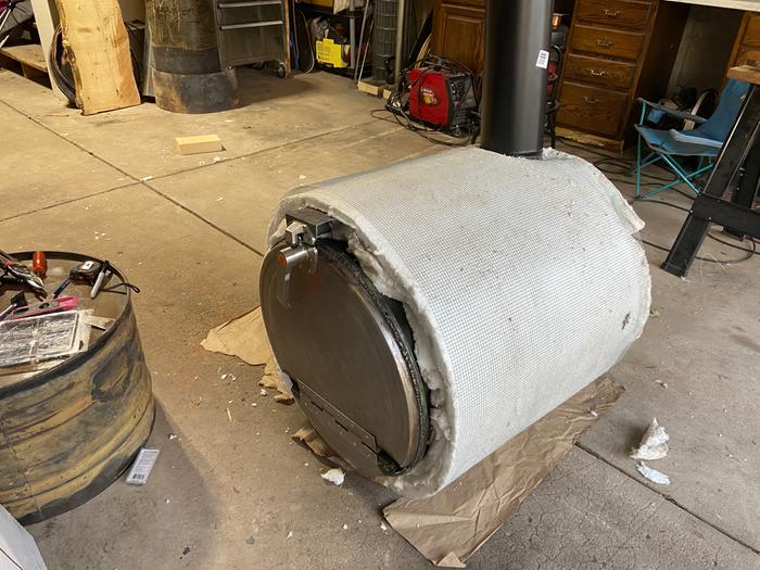 insulating the oven and wrapping with mesh
