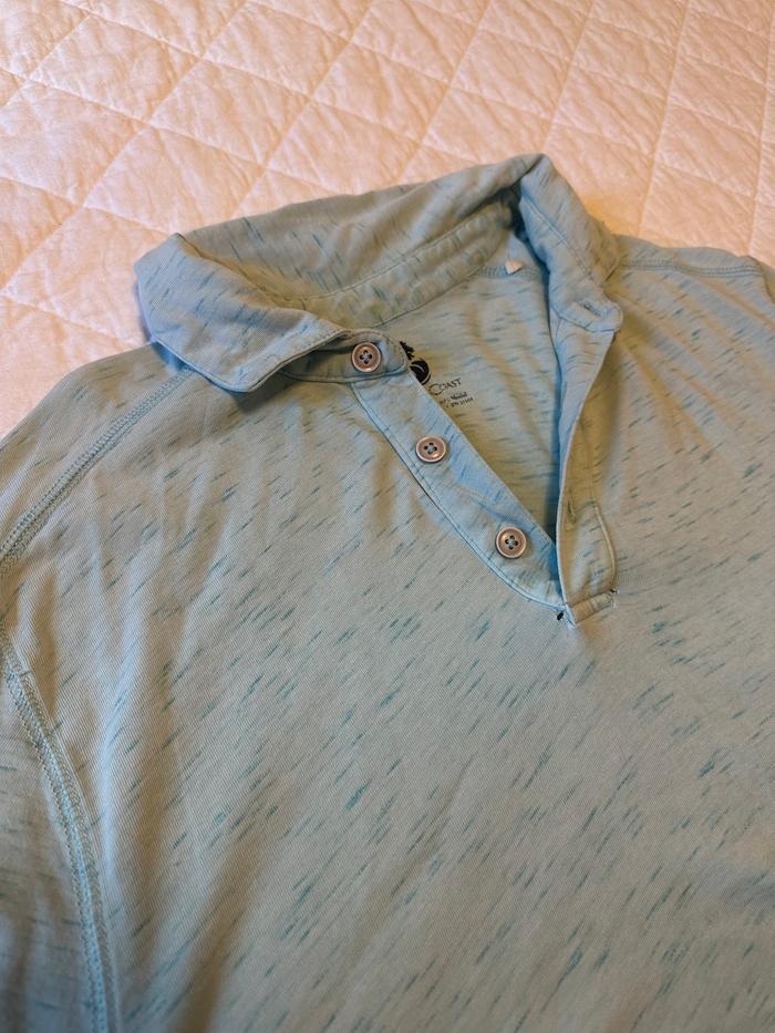 well worn shirt with holes