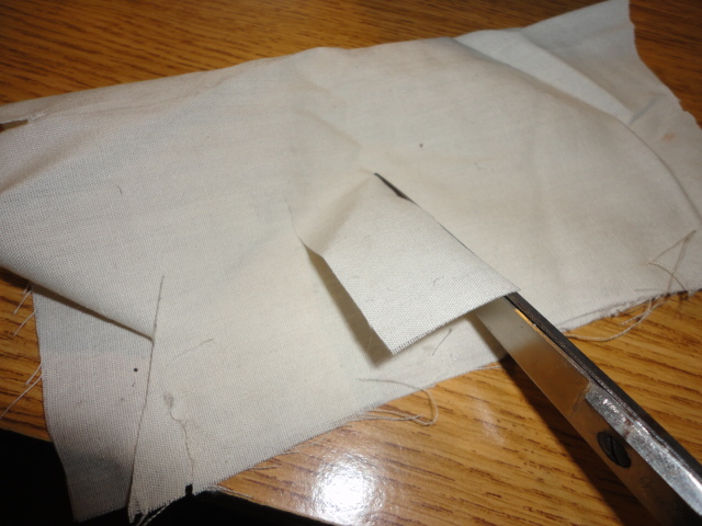 A second shot of cutting the fabric after sharpening.