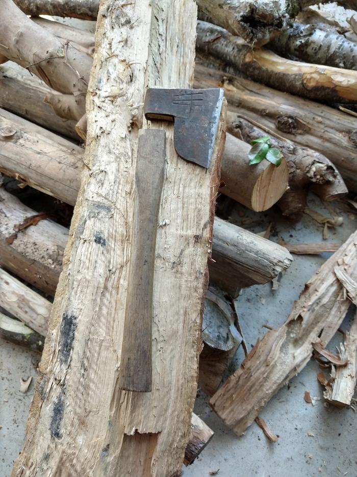 Carving axe with a broken handle