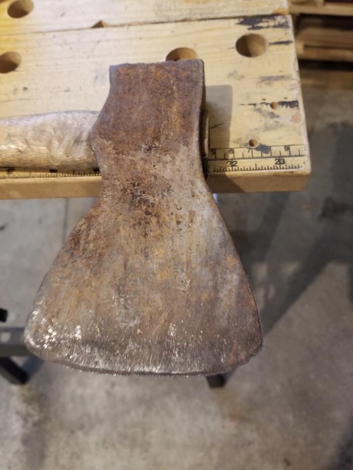 other side of rusty hatchet 