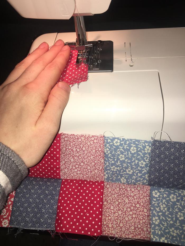 Me sewing it, sorry for the bad quality picture I had to use flash
