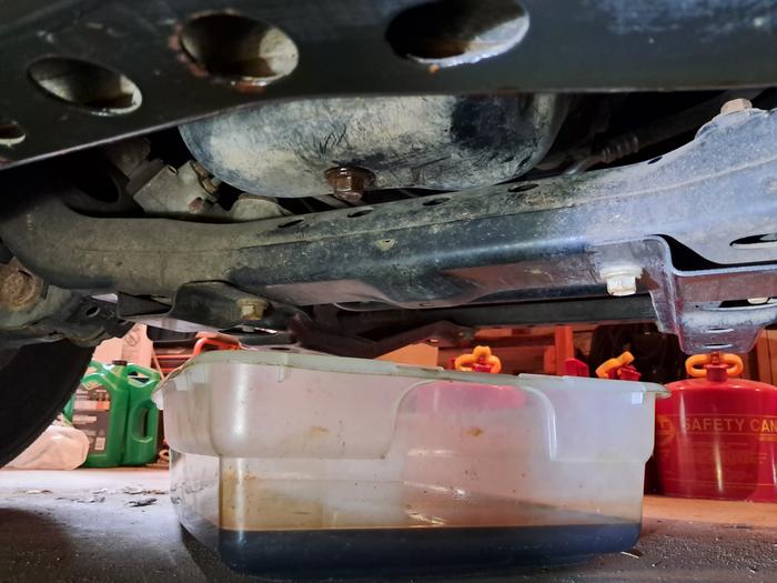 Oil plug back in and filled with new stuff