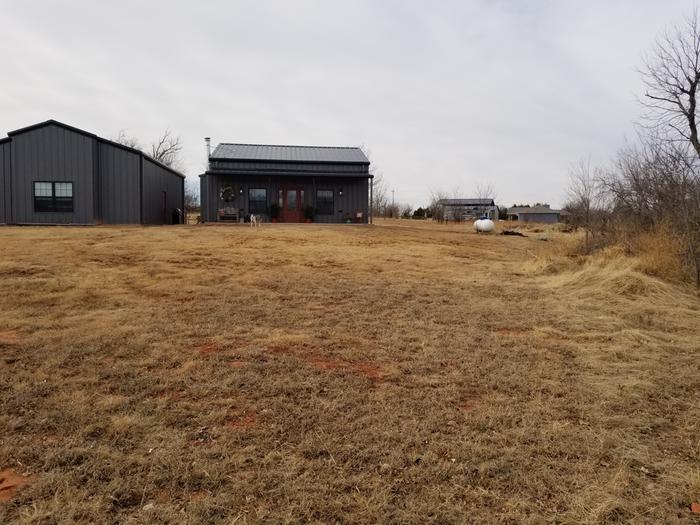 In NE corner looking uphill to house