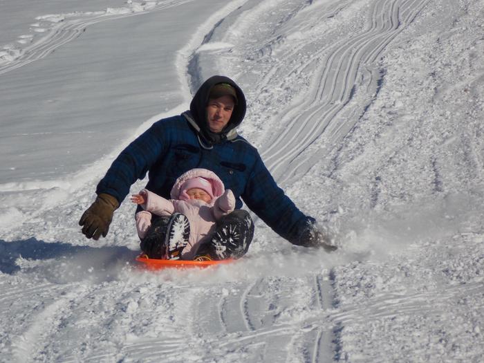 sledding with child