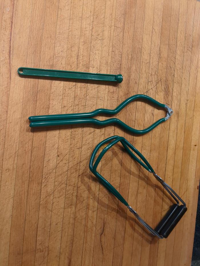 The equipment I used. I have more canning tools but I really only use these three things. Also an oven mitt and paper towels for wiping the rims.