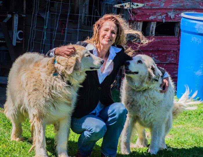 me and my LGD's Bear and Molly during a political photo shoot - not my farm clothes. ;)