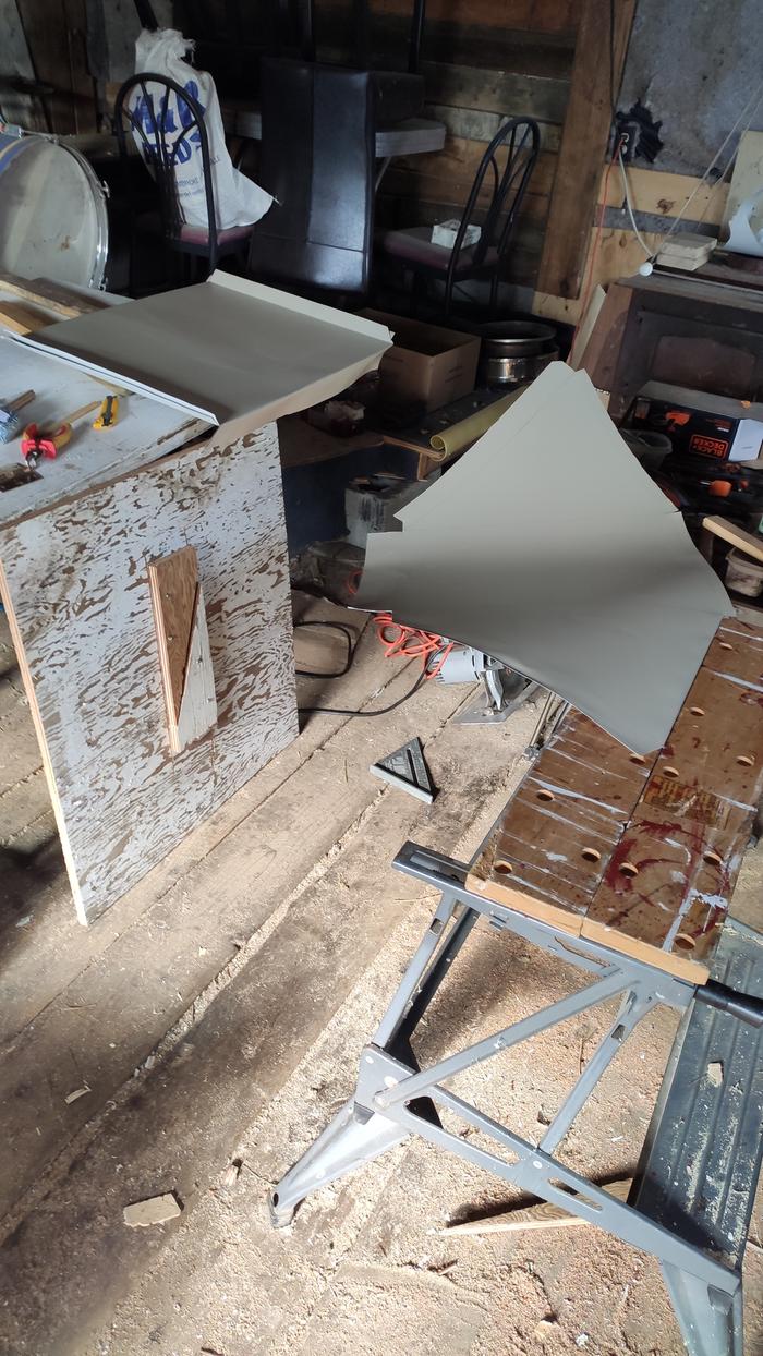 aluminium flashing cut to shape, work bench used to fold edges