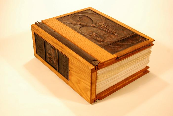 book with wood and metal covers