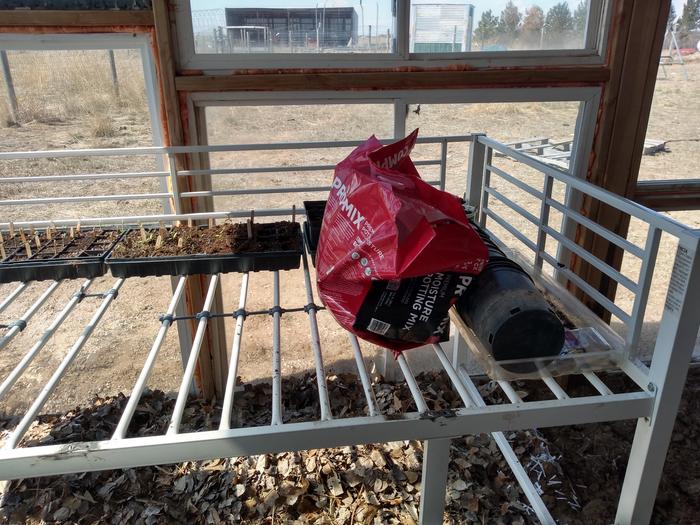greenhouse growing table made from old bed frame