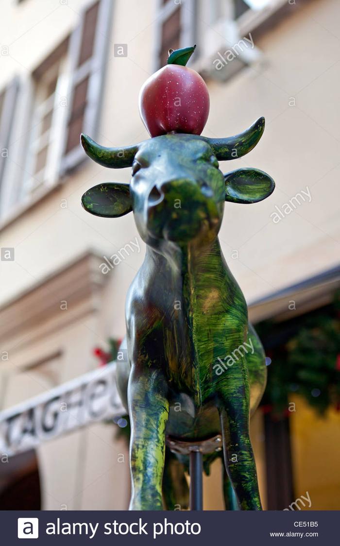 [Thumbnail for symbol-for-switzerland-swiss-cow-with-william-tell-apple-on-the-head-CE51B5.jpg]