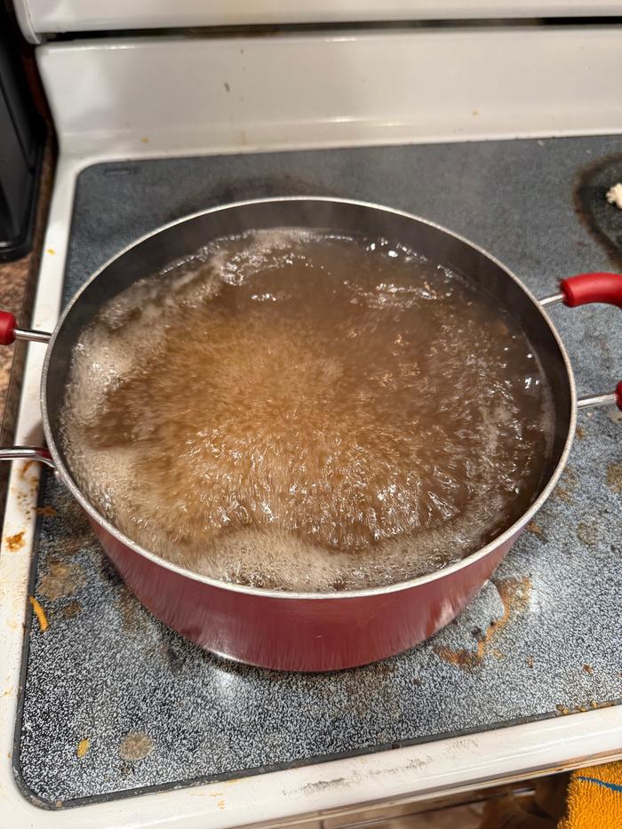 Into yet another smaller pot, and yes the stovetop was messy by this point. I’d spilled some of the sugary yumminess 🤦‍♀️