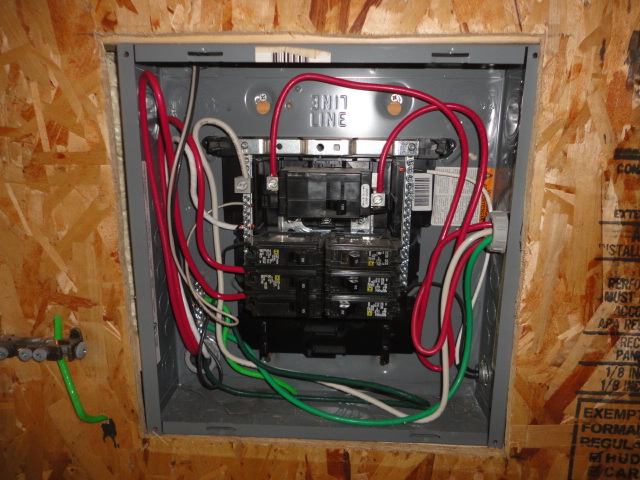 Here is a picture of the breaker box before I added the new breaker and wiring. Note, the new breaker will replace the two on the top right. Those were unused spares.