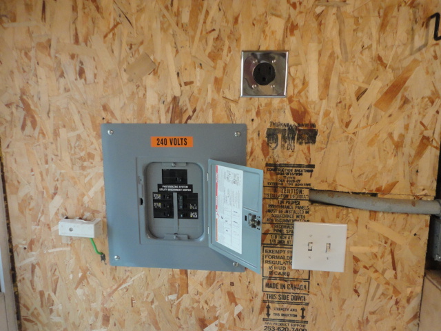 The photo of the overall space after the new outlet was installed and it was all put back together.