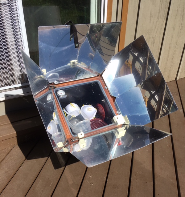 Sun Oven sanitizing my facial masks and their carrying containers. 