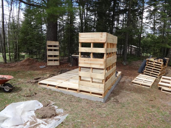 Walls going up. Aren't those some pretty pallets?