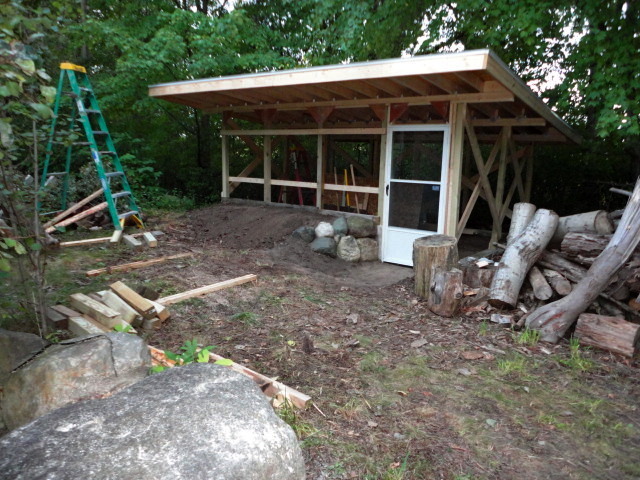 Big jump in progress here! The basic framing and roof are up.