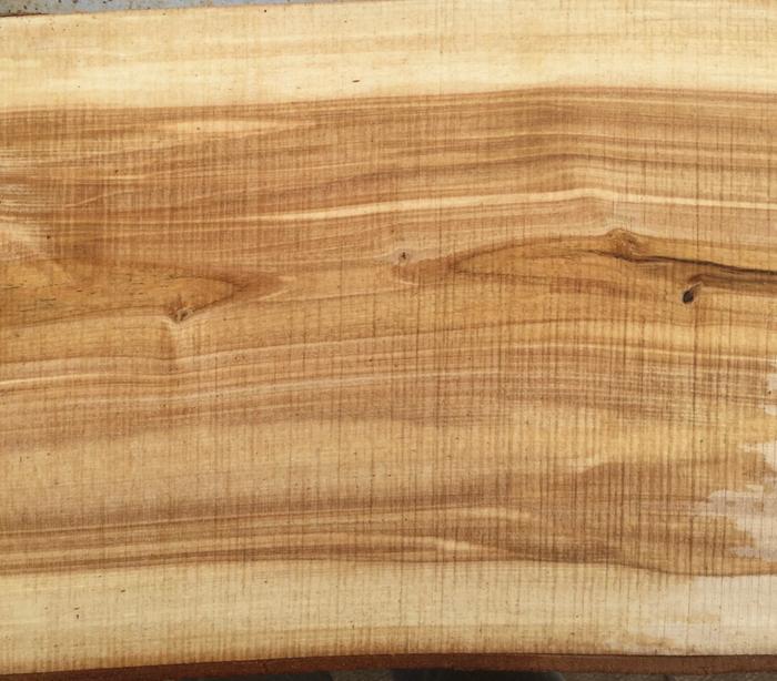 I wet the wood to illustrate what you would see with a typical finish applied. It highlights the difference in coloration between sap and heartwood. It also highlights how dull the blade on my mill was getting!