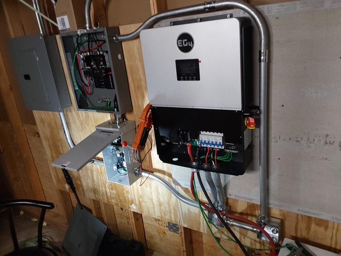 All high voltage wiring needs to be in metal conduit in this county