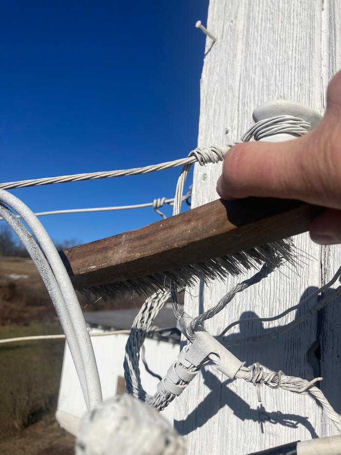Cleaning ground wire at the barn
