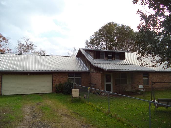 A couple of my nephews did help with this roof job. I did garage and around those upper windows alone