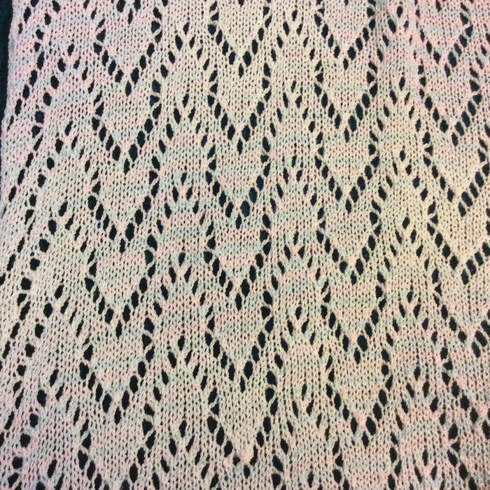 Knitted lace on standard gauge electronic-patterning machine