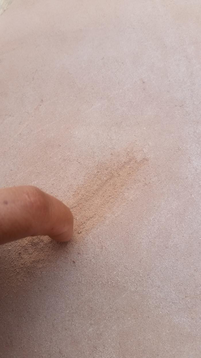 It was hard and resistant and didn't seem too dusty, but I could scratch it...