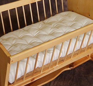 organic crib mattress and wood cradle