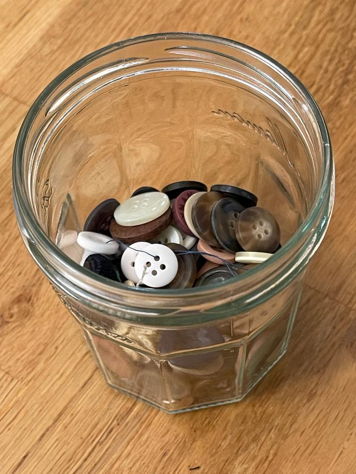 jar of harvested buttons