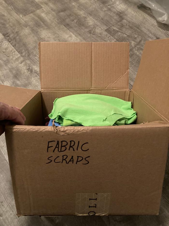 Harvested fabric in a labeled box 