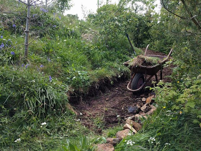 Digging a way down the hill....