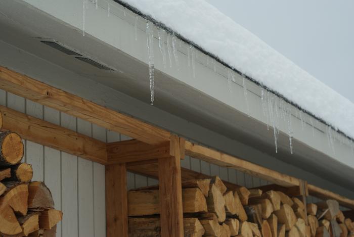 Water drips from an icicle