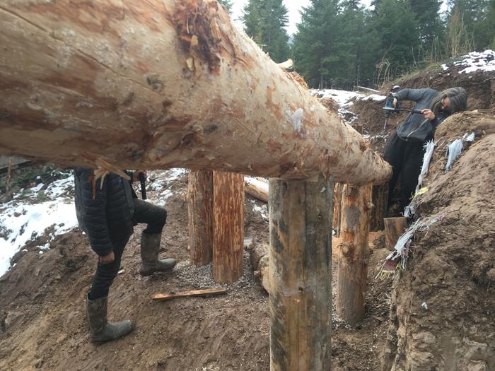 Jen works on rafter install 