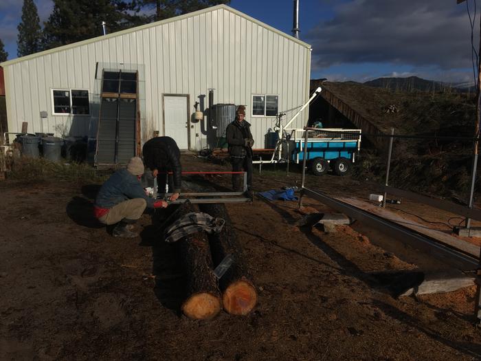 Clayton and Josiah on sawmill maintenance 