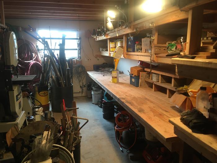 Clearing that workbench so it can be used as a workbench 