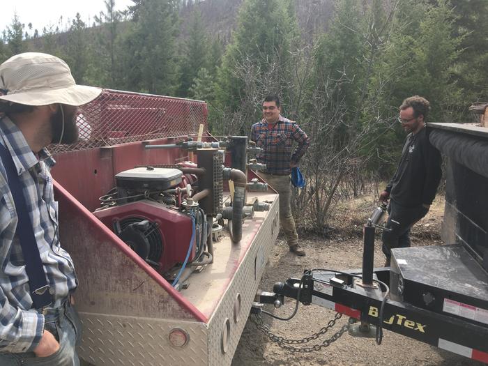 Waiting for brakes to cool, after the downhill with full load of wood