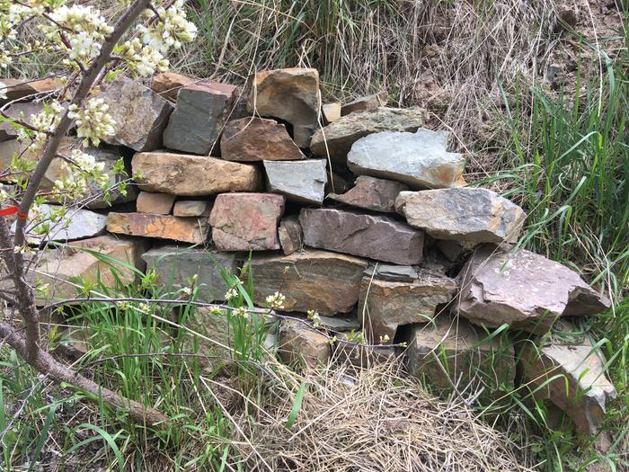 Dry stack, standing model in turtle lot.. the solarium walls will sit atop something like this