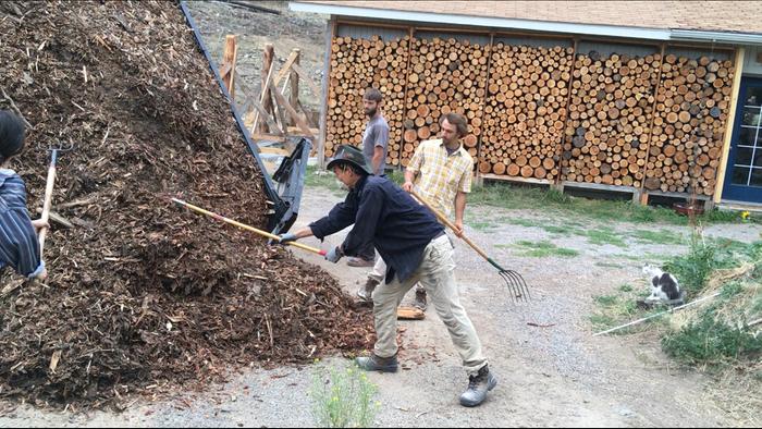 The five of us unloading the mulch 