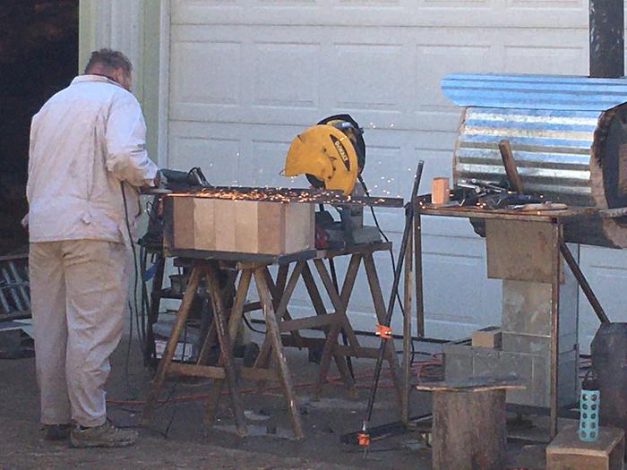 Rodney makes sparks for j tube fabrication