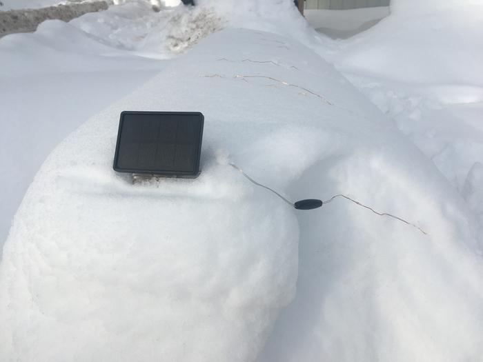 Solar light I set up on a snowy bench