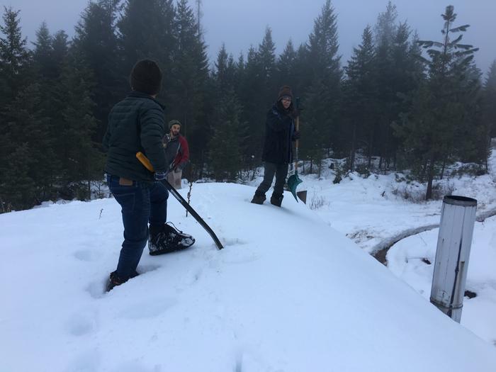 W and M helping with shovels atop Cooper cabin