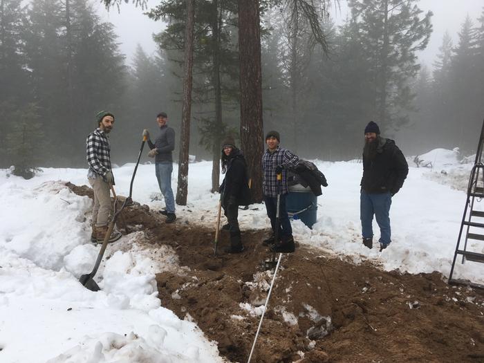 More shoveling to c cover a trench