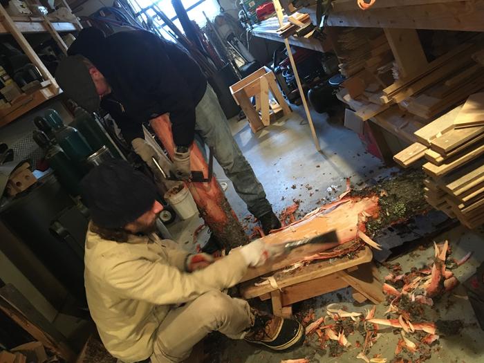 C and Snowflake carve some Greenwood for a bucking horse