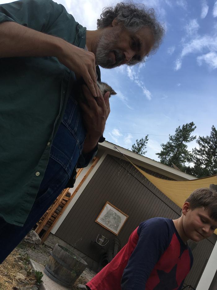 Paul holds little Fern the kitten