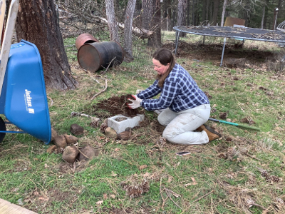 rocks and soil fill then placing the sod