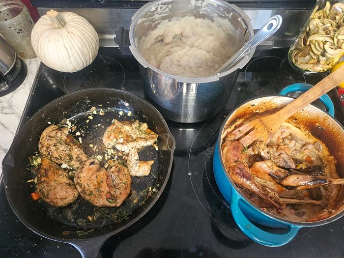 The pheasant breasts in the cast iron skillet, legs in the crock, mashed spuds in the back for sopping up reduction/gravy sauce