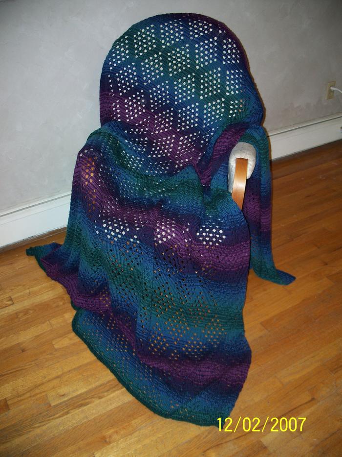 This wool afghan was knitted for my sweetheart, with both a complex pattern and color sequence. Fun stuff!