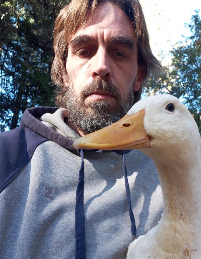 Me in need of a haircut and the first pekin.