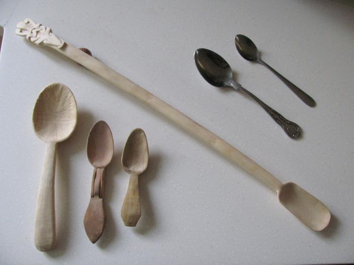 First lot of spoons together with tablespoon for scale